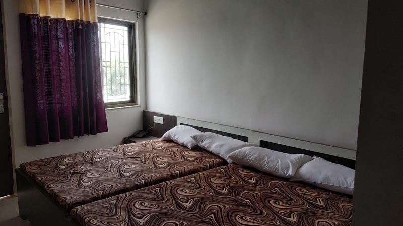 shri ganga vatika hotel four bed room image